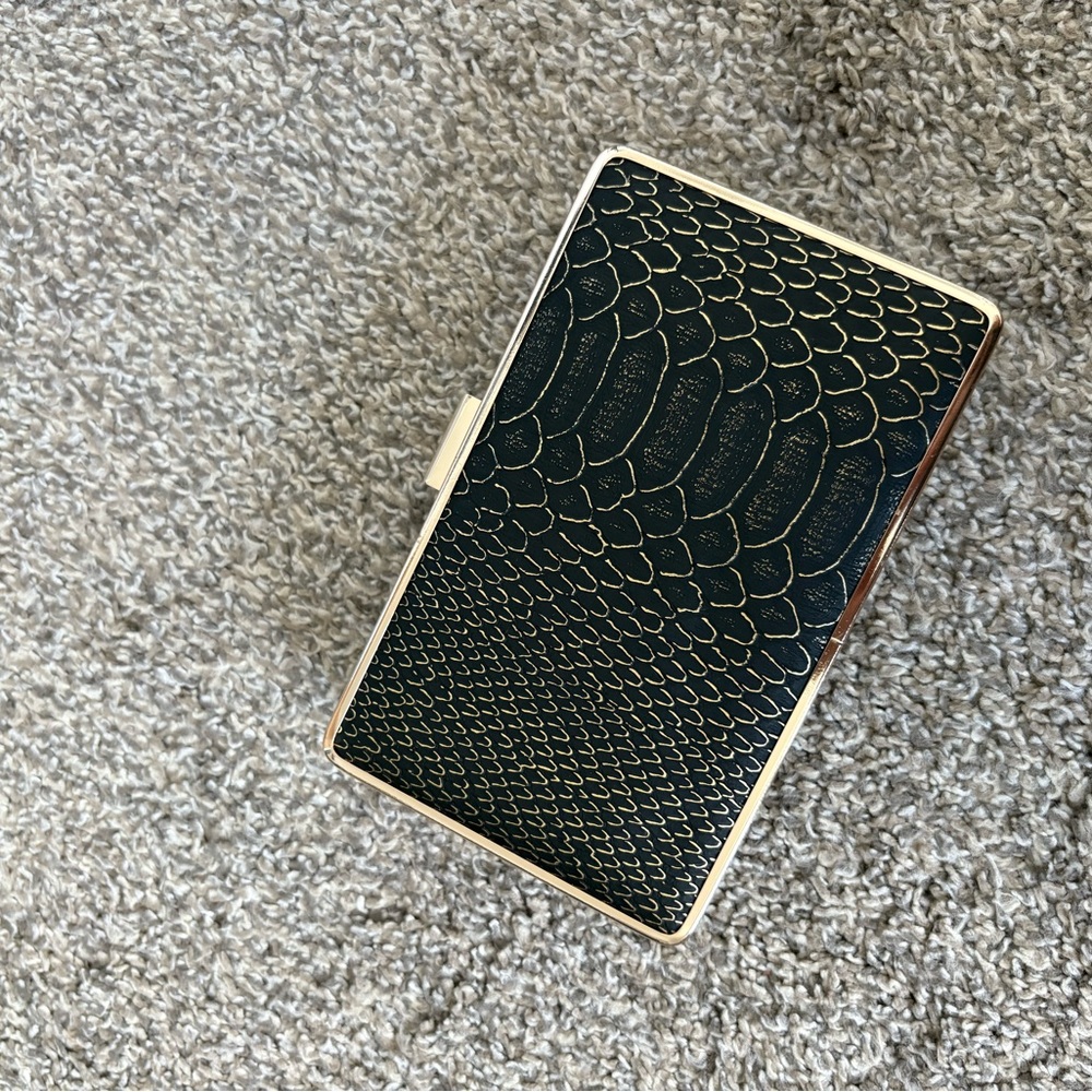 Jessica McClintock Black and Gold Patterned Clutch